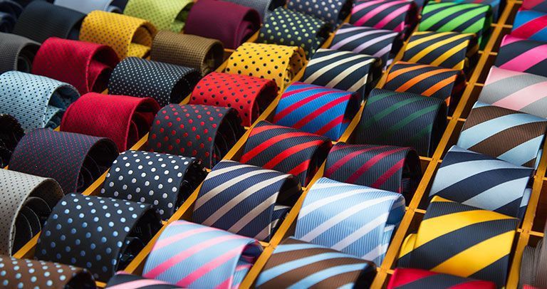 Testimonials - Chris Swales: A selection of colourful striped ties.